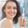 Электрическая зубная щетка Oral-B Genius X Cross Action D706.513.6 (розовое золото)